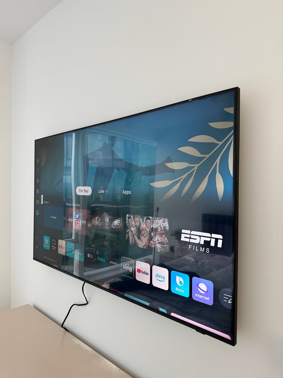 Wall-mounted TV installation